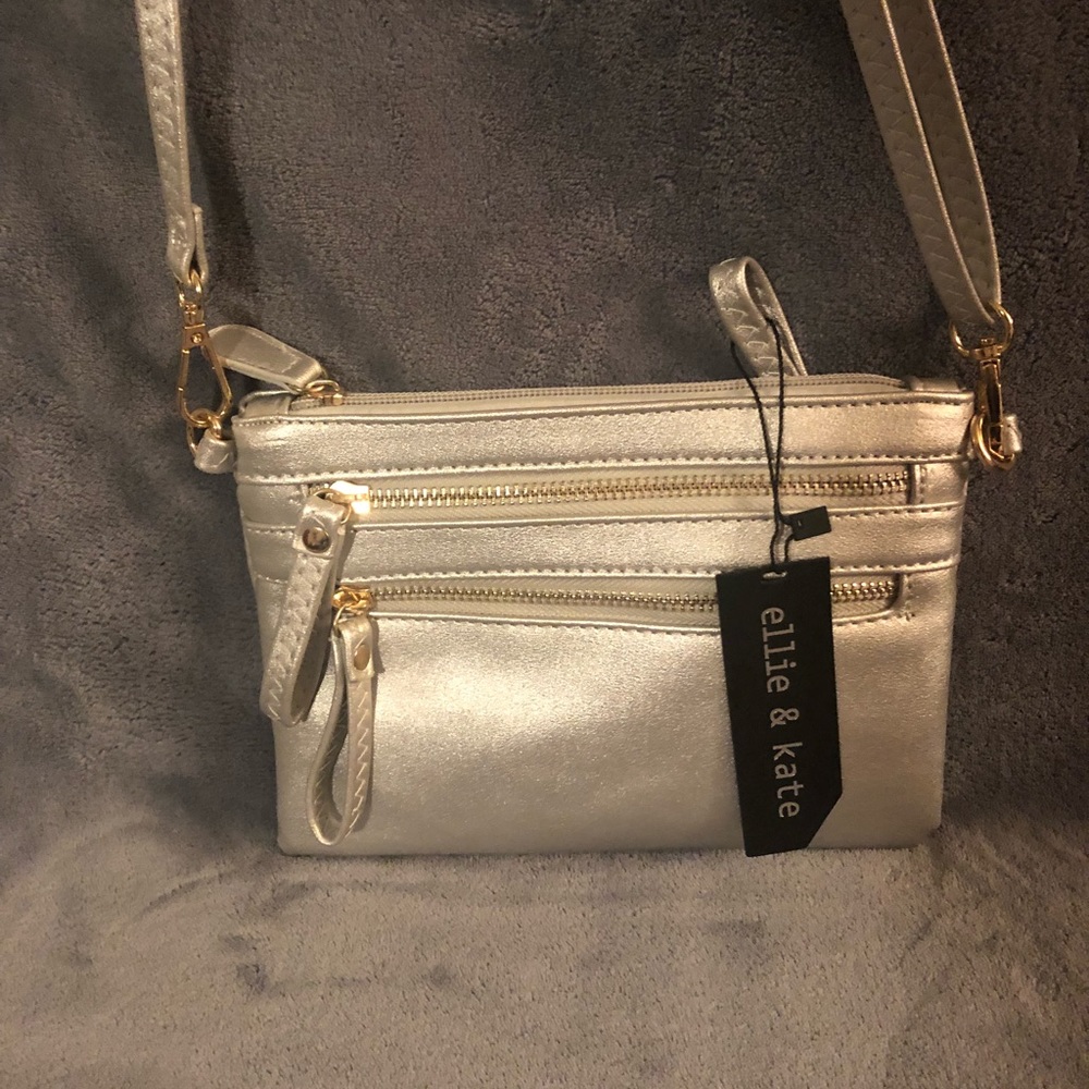 Brand new Ellie and Kate crossbody wristlet silver